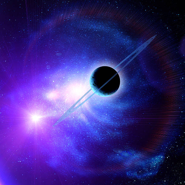 istock planet with rings against the sun in blue space 176492032