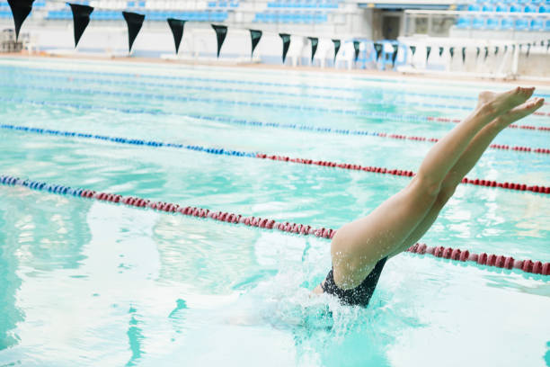 istock Professional swimmer diving into the pool 1764923806