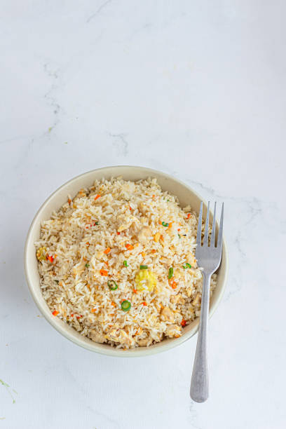 istock Asian Fried Rice in a Bowl Top Down Vertical Photo 1764943005