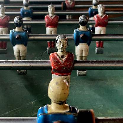 Close upof an old damaged table football game