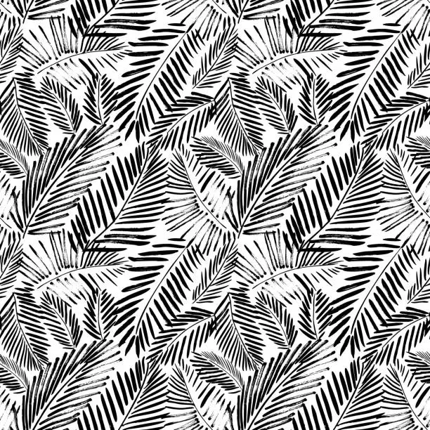 Vector illustration of Brush drawn palm leaves seamless pattern.