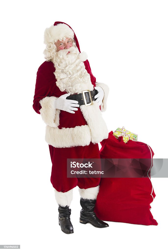 Santa Claus Stand mit Tasche mit Geschenken - Lizenzfrei Geschenktüte - Geschenk Stock-Foto