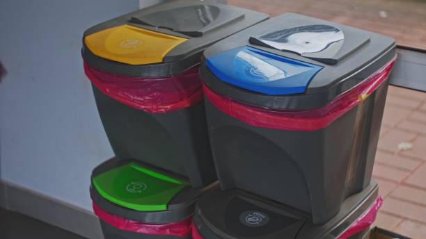 Set of Recycling Friendly Garbage Bins for Waste Sorting and Separation with Colorful Lids and Symbols