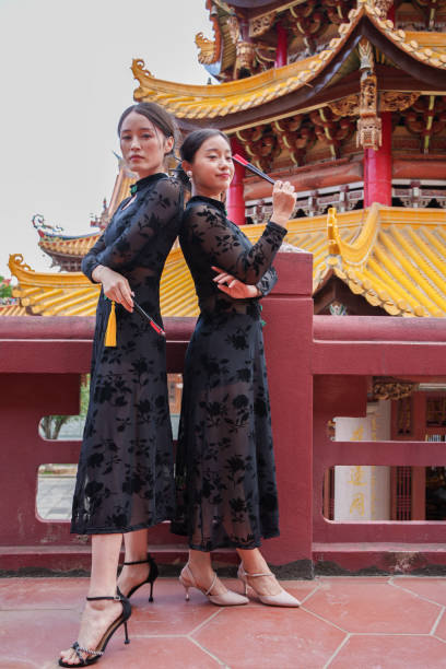istock woman wearing black full skirt 1764971913
