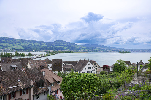 Drone Aerial view of View over Lake Geneva, Swiss and French Alps, Vevey Vaud and city scenery scape switzerland