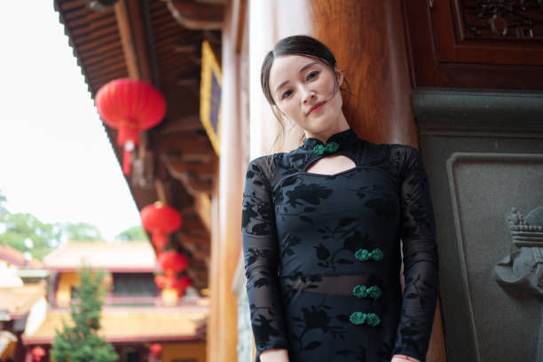 istock woman wearing black classic clothes 1764975224