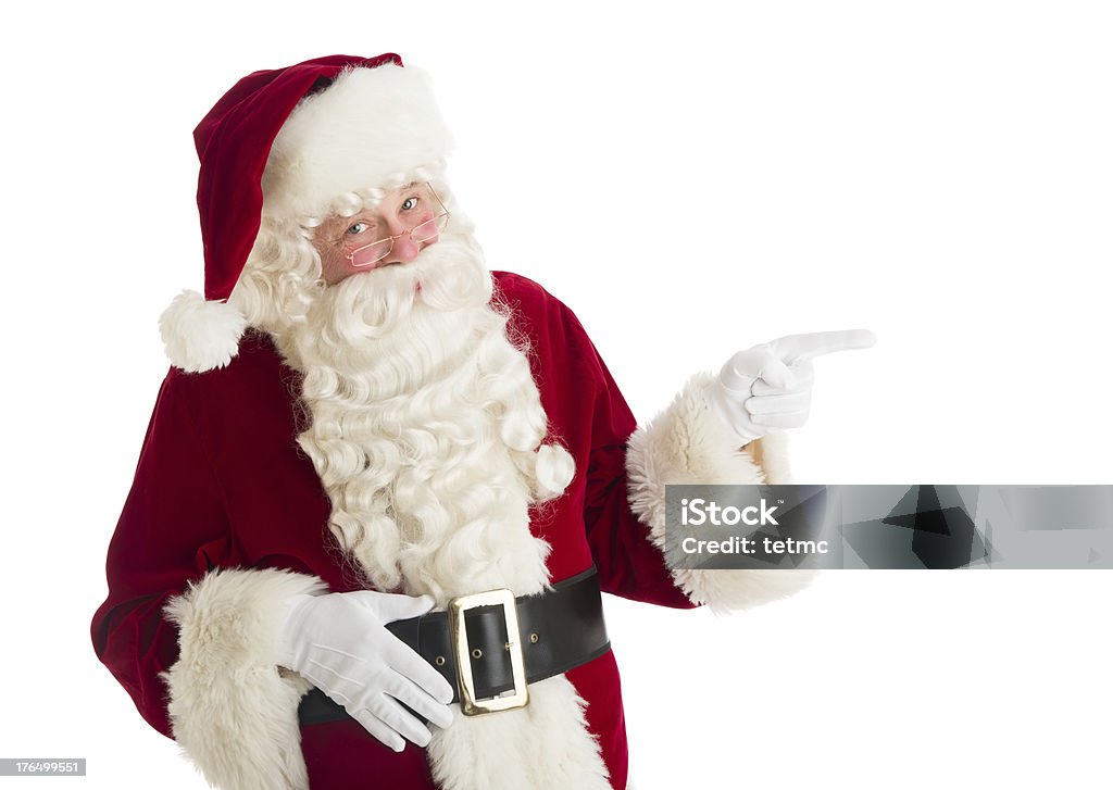 Santa Claus wskazując w kopii przestrzeni - Zbiór zdjęć royalty-free (Święty Mikołaj)