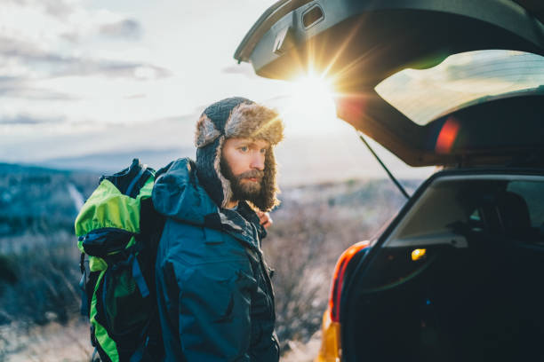 istock Man taking luggage from the car 1765008080