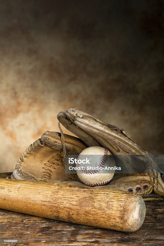 Antique baseball gear Baseball bat with ball and old weathered glove Baseball - Ball Stock Photo