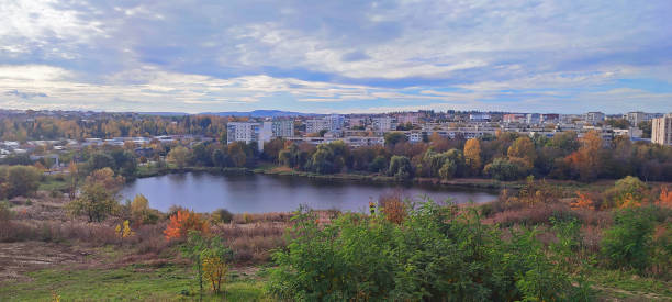 istock autumn landscape with lake and buildings 1765062811