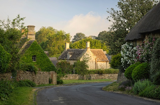Castle Combe village and By Brook river, Wiltshire in the England Cotswolds, the historic area has not new houses since 1600 and was England's prettiest village in 1961