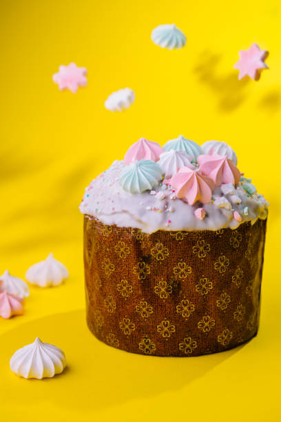 istock Traditional Easter cakes with meringue on yellow background 1765127376
