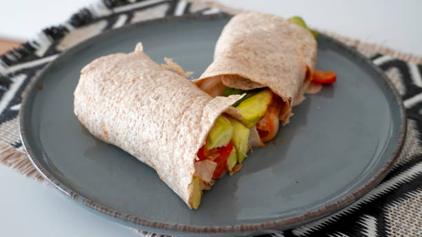 istock Vegan grilled vegetable wrap on gray plate 1765139506
