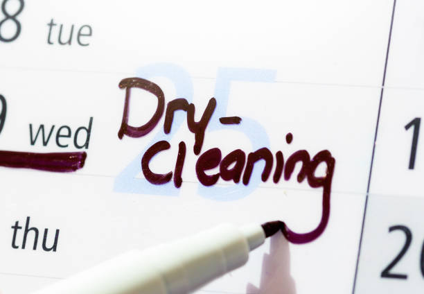 istock Dry cleaning reminder, handwritten on a year planner calendar 1765168799