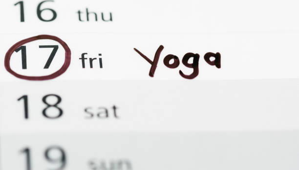 istock Yoga appointment handwritten on a year planner calendar 1765169421