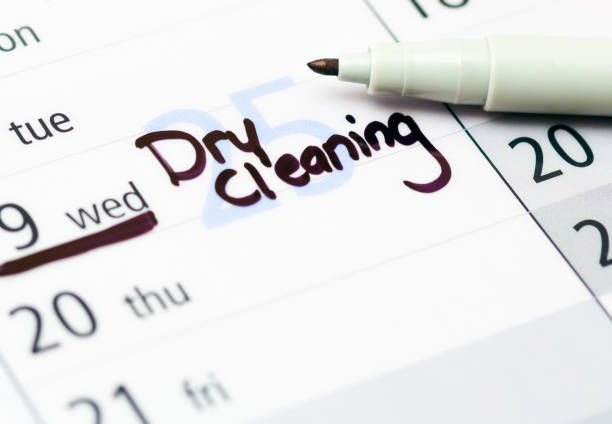 istock Dry cleaning reminder, handwritten on a year planner calendar 1765169647