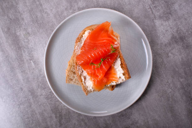 istock Bruschetta with smoked trout slices and cream cheese 1765183155