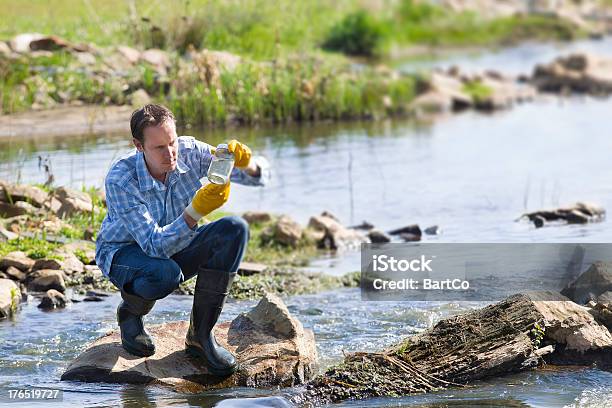 Hydro Biologist Testing Quality Of Water Stock Photo - Download Image Now - Engineer, Water, Environment