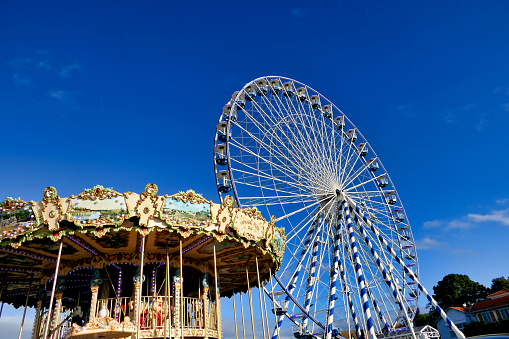 Miami, USA - November 10, 2020: New attraction in downtown Miami, from the Sky Views company, which has installed a Ferris wheel in the Miami Bayside Marketplace area. It reaches a height of 200 feet above the ground.