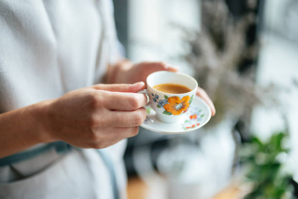 istock Anonymous Woman Holding a Cup of Coffee 1765226560