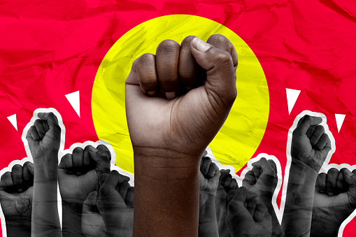 Fist, protest and fighting for human rights with people on a red background together to rally a crowd. Hands, power and equality with an adult group at a march for freedom, justice or change