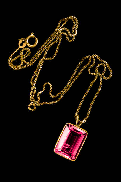 istock Gold necklace on black 1765234937