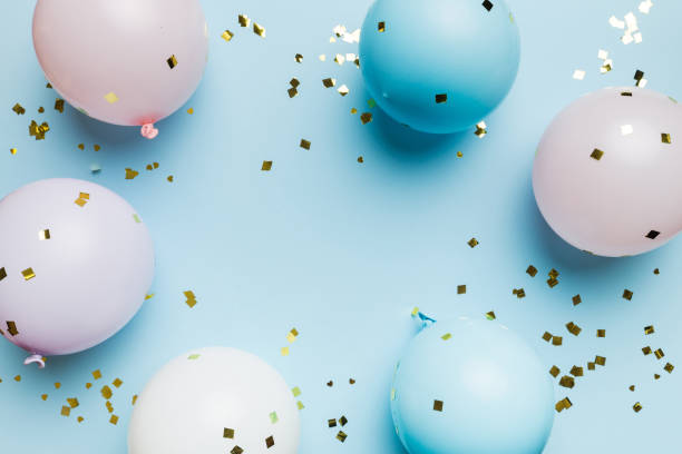 Flat lay party decoration concept on pastel colored background from above. Love concept. Holiday celebration. Valentine Day or birthday party decoration