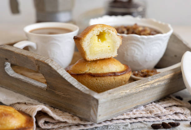 istock Pasticciotto leccese pastry filled with egg custard cream on a tray close up 1765240786