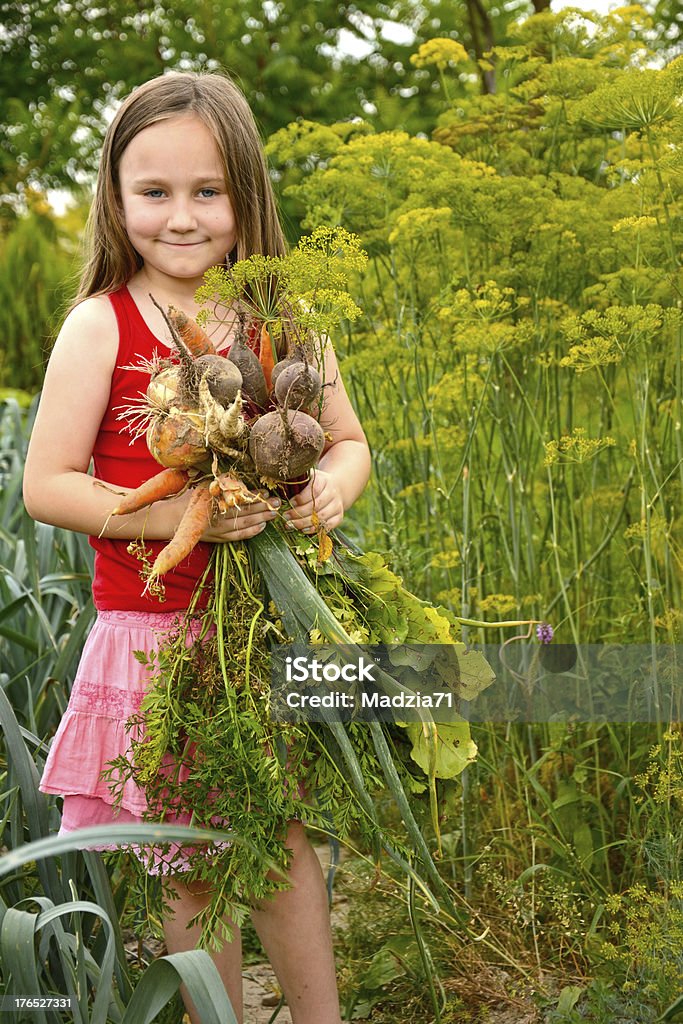 Menina no jardim - Foto de stock de Alho porró royalty-free