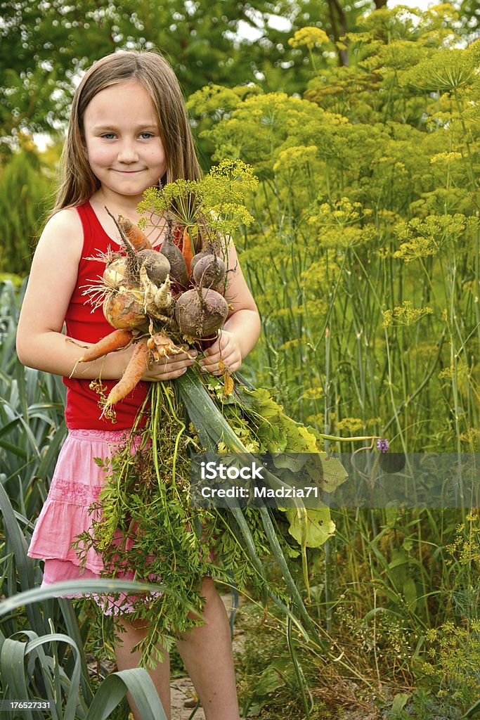 Девочка в саду - Стоковые фото Порей роялти-фри