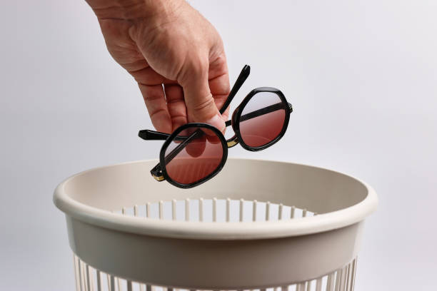 istock Old broken glasses are thrown into the trash for recycling or disposal. 1765296843