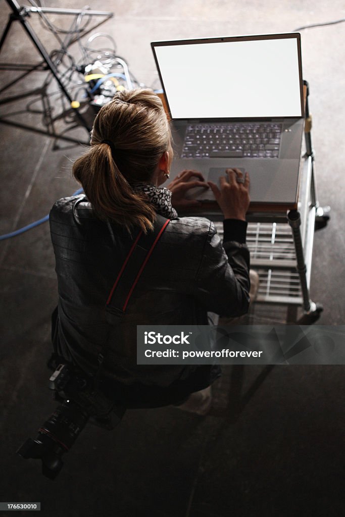 Film Crew Working on Set High angle view of crew working on a set. Film Set Stock Photo