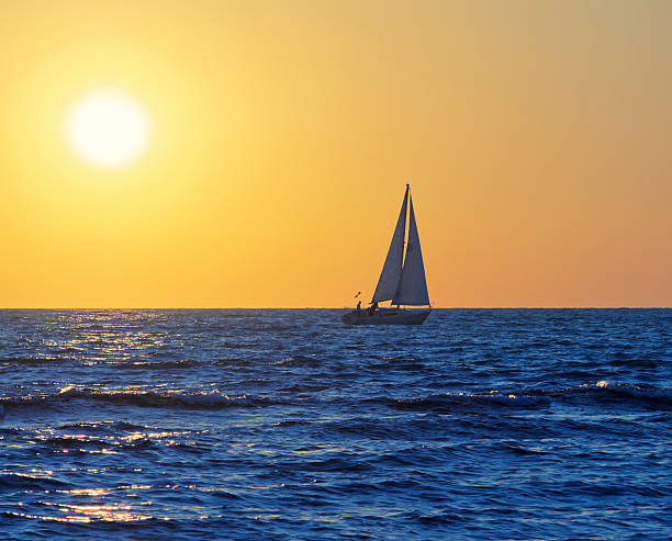 istock Sailing boat, sea, horizon, sunset 176532604