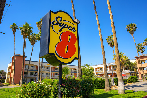 Bakersfield, California, USA - June 17, 2023: Exterior and sign of Super 8 Worldwide, formerly known as Super 8 Motels. Super 8 is a large budget hotel chain and a part of Wyndham Worldwide.
