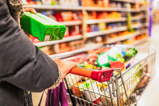 Adding Things Adding Items To The Trolley Stock Photo - Download Image Now - Basket ...