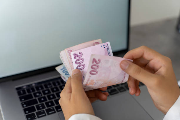istock Businesswoman counting Turkish money. 1765332232