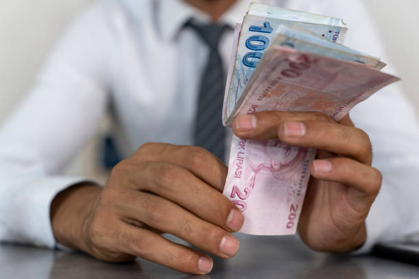 istock Businessman counting Turkish money. 1765337832