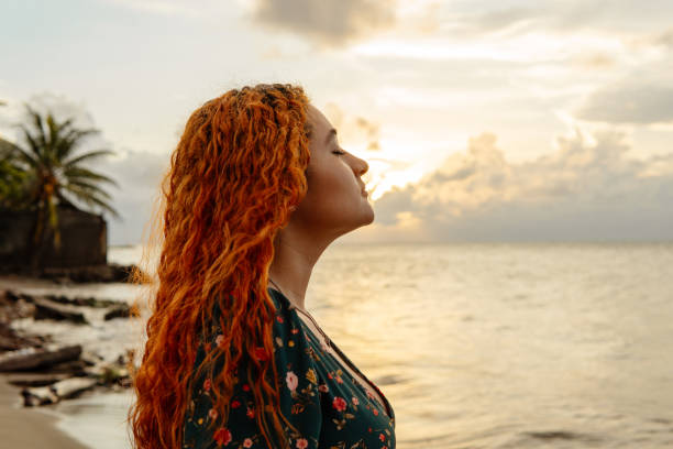 istock Young hispanic woman breathing fresh air at sunset 1765341890