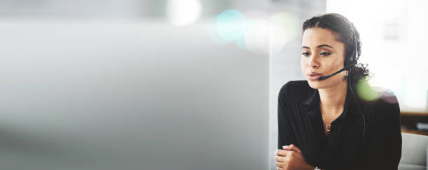 istock Business woman, call center and computer for communication mockup, customer service or support consultant. Professional agent or telecom worker talking on desktop for contact us or e commerce banner 1765368879