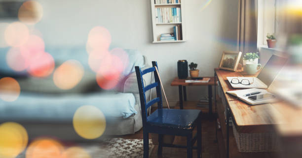 istock Home office, remote and laptop with notebook on empty for overlay, bokeh and banner for mockup. Technology, workspace and desk with diary in living room with glasses, coffee or phone for entrepreneur 1765368894