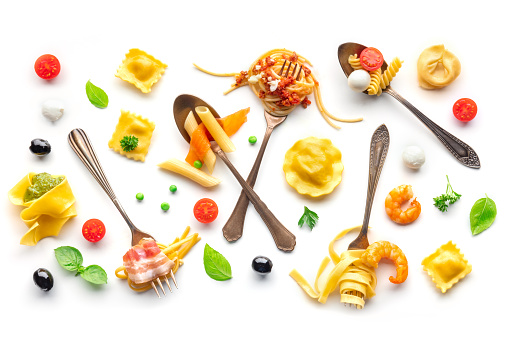 Various pasta forks. Spaghetti, fusilli, penne and other shapes of pasta, with sauce, overhead flat lay shot on a white background. Bolognese, Carbonara et al