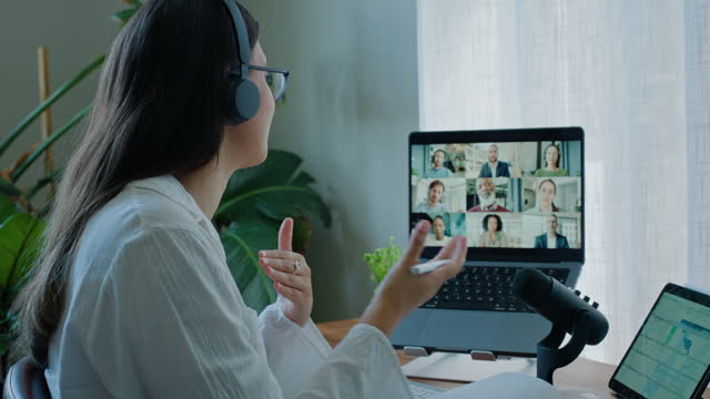 Woman, laptop and video call in virtual meeting, remote work or business proposal at home. Female person, intern or employee talking to team on computer in schedule planning, webinar or collaboration