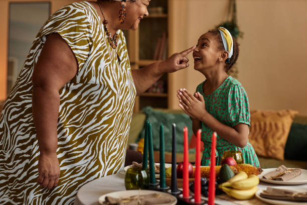 istock Grandmother and Granddaughter Playing 1765389737