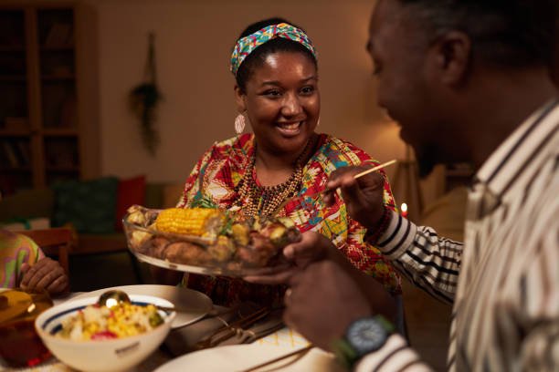 istock Woman Offering Dish to Husband 1765390303