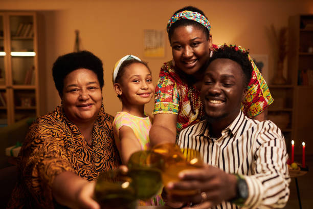 istock Family Toasting when Celebrating Kwanzaa Holiday 1765390326