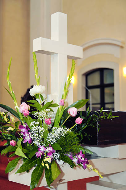 istock Cross a bouquet on the altar 176540030