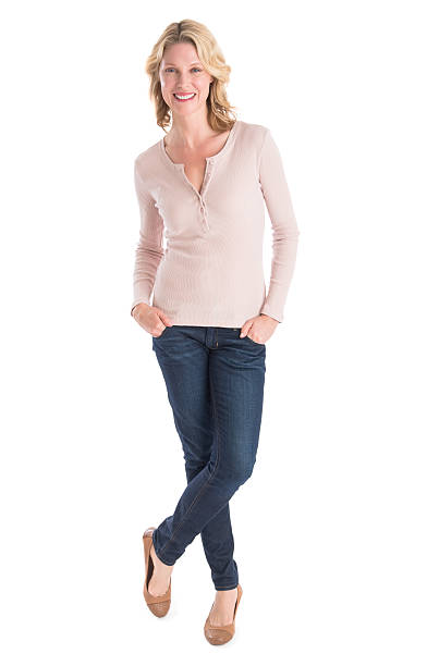 istock Beautiful Woman Standing Hands In Pockets Over White Background 176540201
