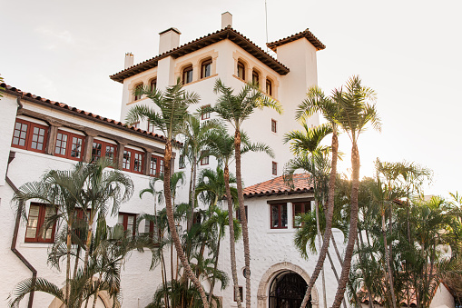 European Inspired Courtyard with a Golden Sunbeam of Light in the Background in Palm Beach, Florida During a Golden Hour Sunset in the Fall of 2023