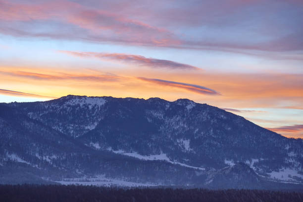 istock Cold snowy mountain landscape at sunset. 1765421438