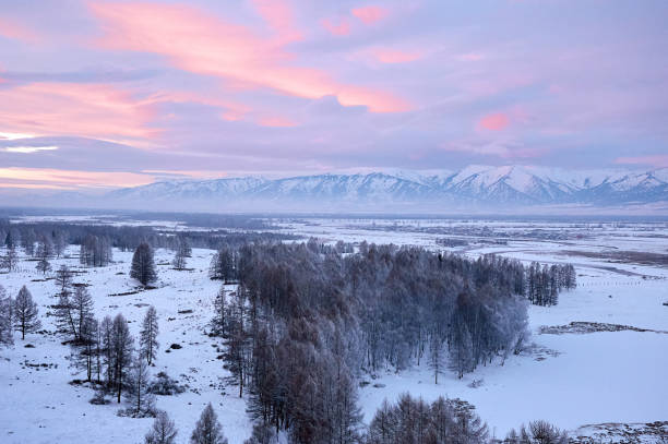 istock Cold snowy mountain landscape at sunset. 1765423142